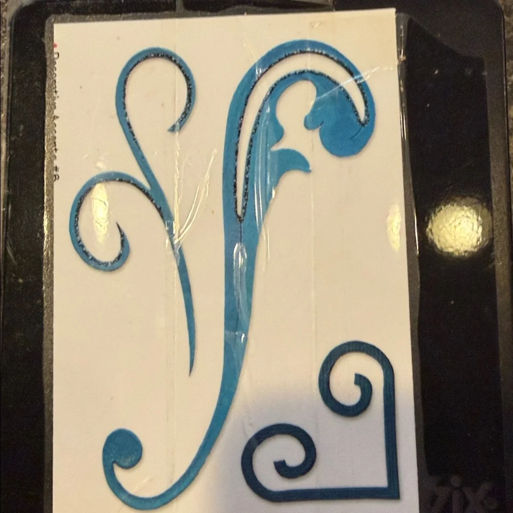 Intricate swirls and decorative accents dies. Set of 3 Designs